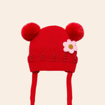 red daisy pom pom baby cap 