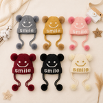 cute smiley pom-pom baby hat